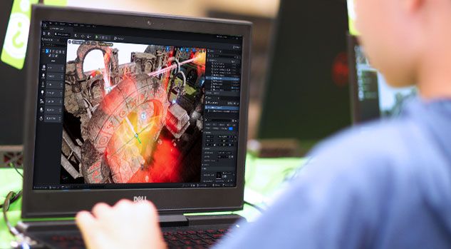 boy on laptop working on unreal engine game design